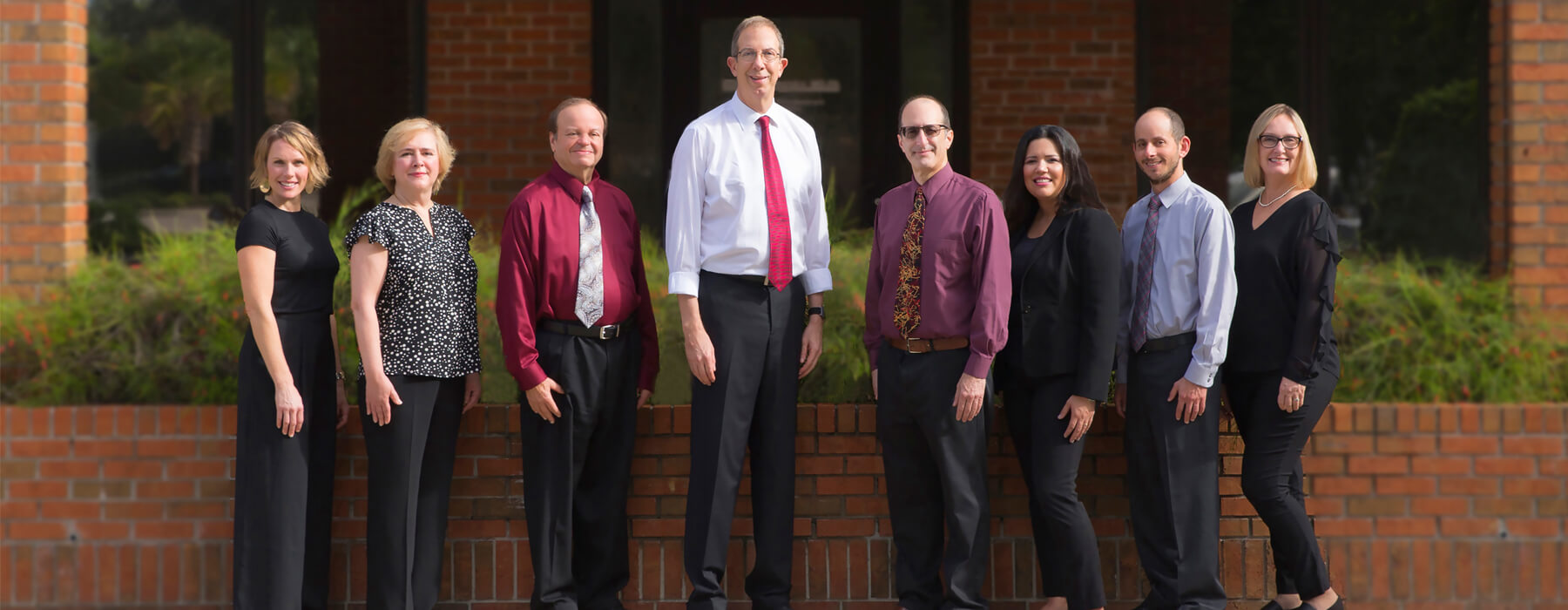 A group of people standing next to each other.